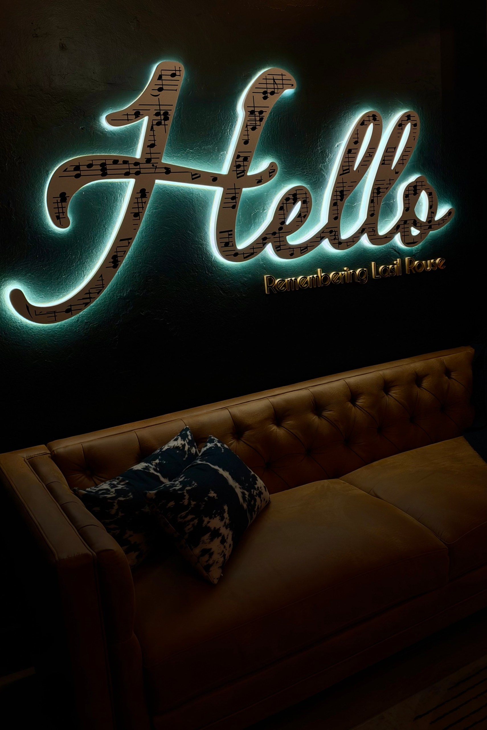 Hello sign and couch inside Coffee on the Rock